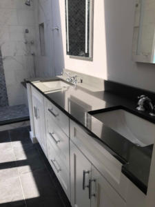 Double vanity with shower