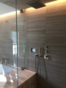 Master bath shower with rainhead handshower thermostatic valve and 2 volume controls.  